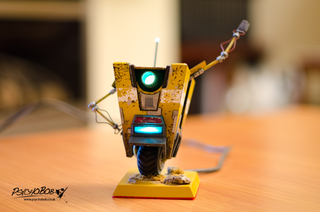 Illustration for article titled Claptrap Exits Borderlands, Enters Real World